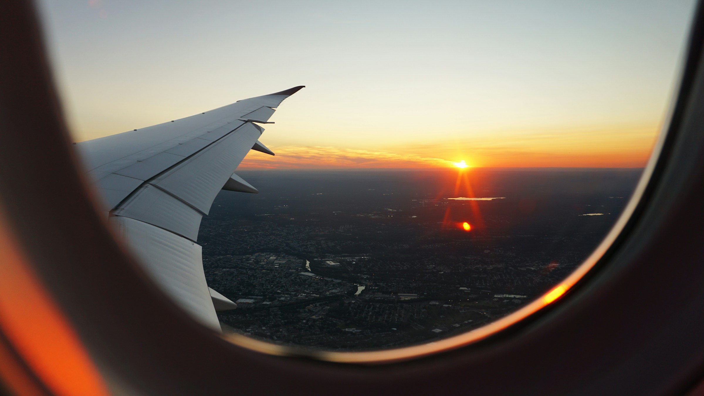 View from an aircraft window at sunset